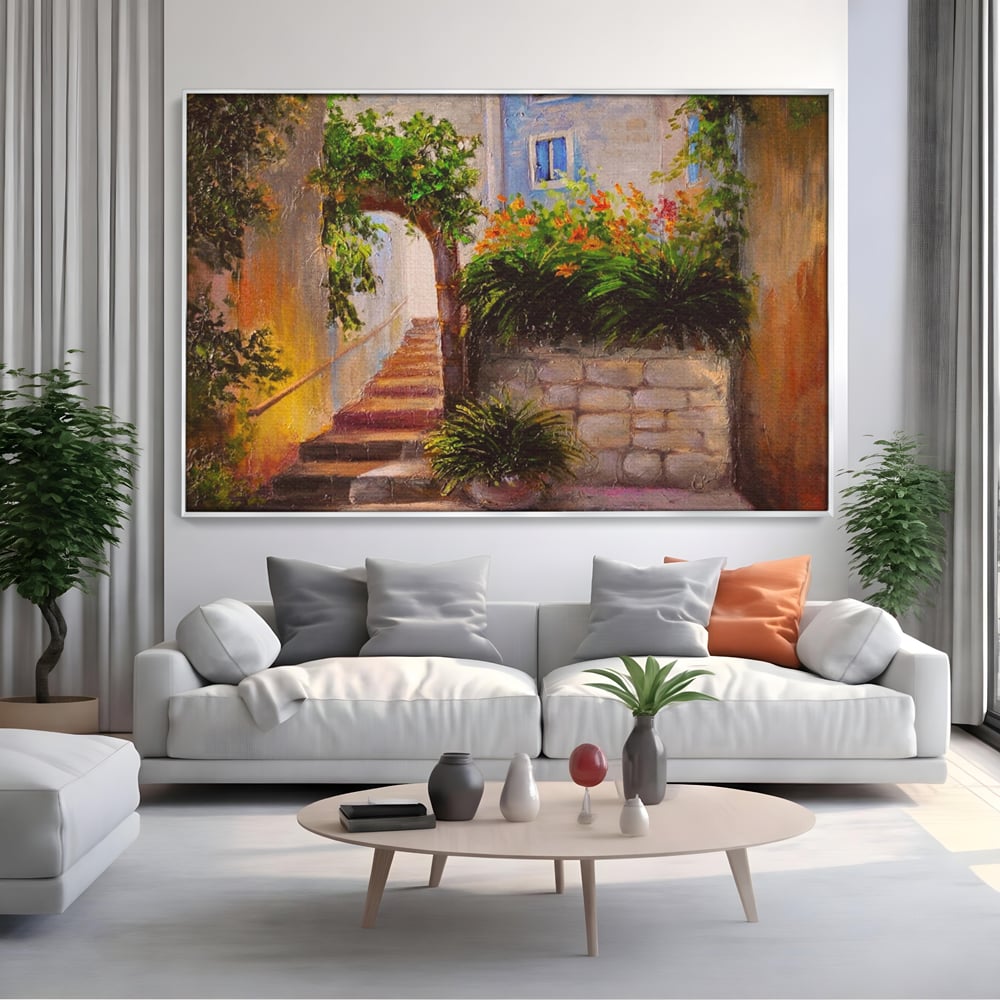 Tablou canvas cu pictura cu scari si flori, in rama de aluminiu argintiu, pe perete intr-un living